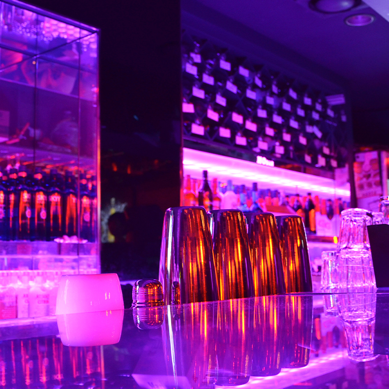 modern bar illuminated by black light