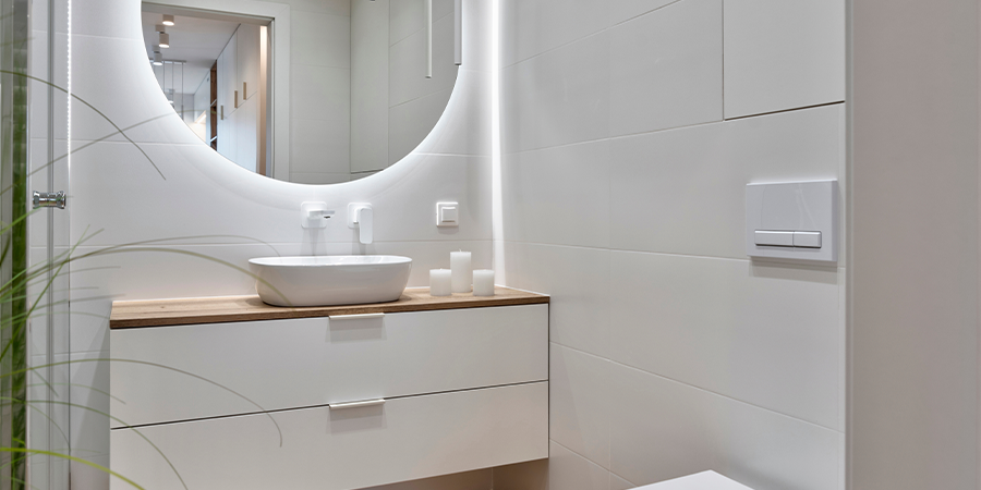 Sleek bathroom design featuring cool white lighting