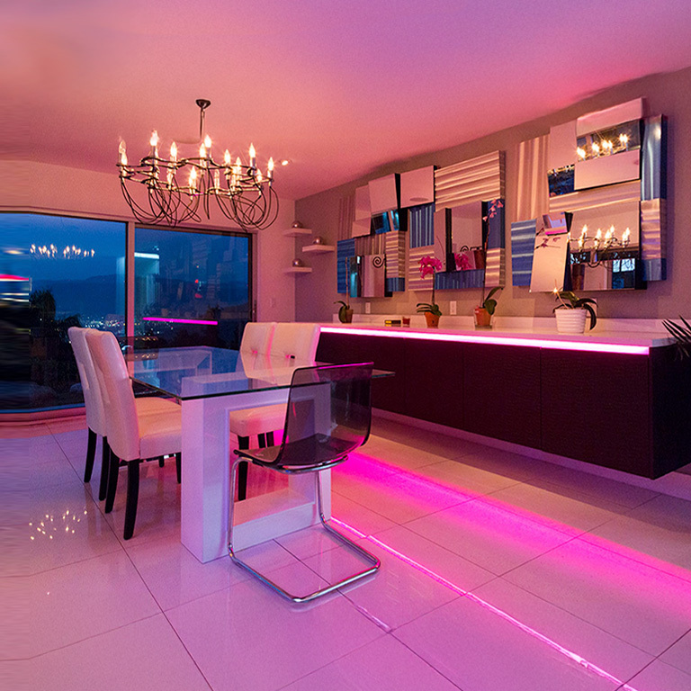 Countertop bar illuminated with pink RGB strip lights