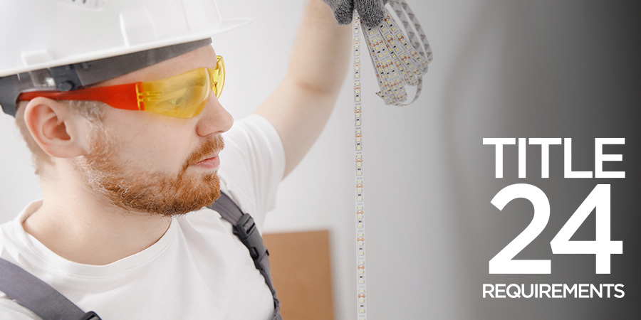  A professional electrician in safety gear examining and installing LED strip lights