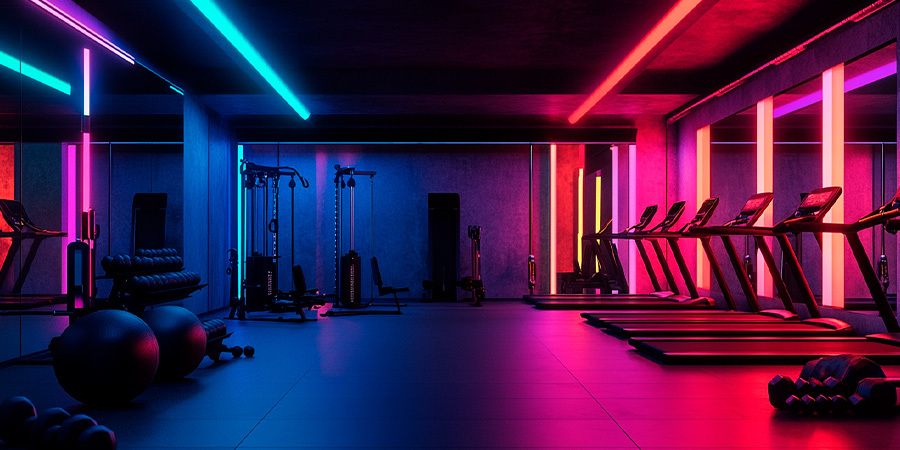 Fitness center featuring colorful RGB lights to enhance workout motivation.