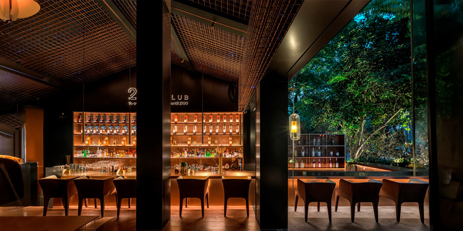 Elegant hotel bar with lighting design under the bar and on the shelves made with LED Strips lights