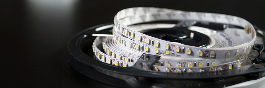  A roll of flexible LED strip lighting with small, densely packed LED lights.