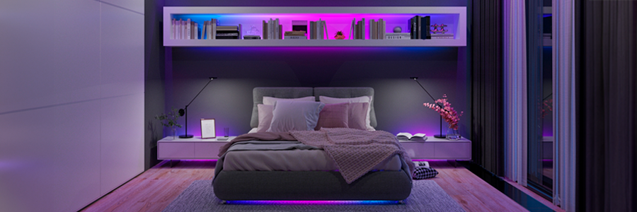 Modern bedroom illuminated by digital pixel LED strip lights at night, creating a cozy and futuristic ambiance.