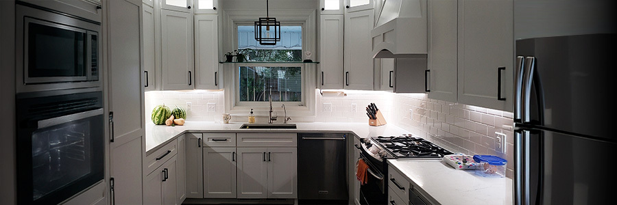 Modern kitchen with white under cabinets strip lights